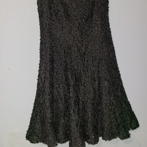 Carmen Marc Valvo dress in size 6 color black woth beads!